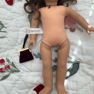 American Girl Doll with Brown Hair and Purple Purse